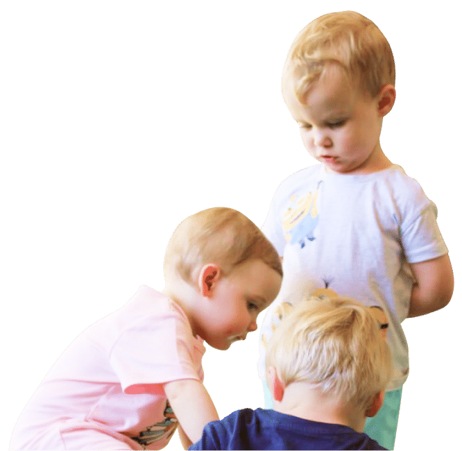 Three toddlers exploring together