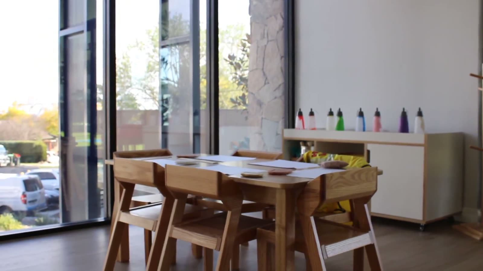 Art table with paints and chairs